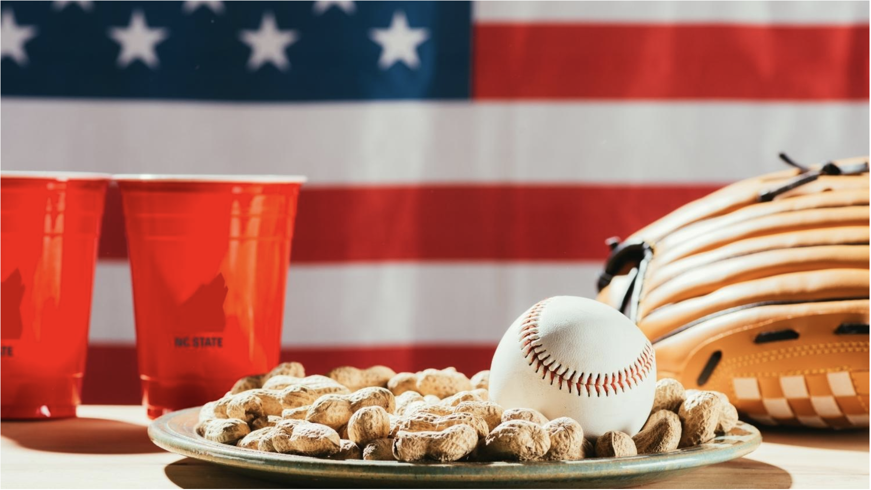 In-shell peanuts on a baseball americana background